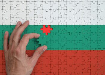 България