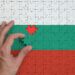 България