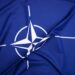 NATO flag.North Atlantic Treaty Organization flag waving.