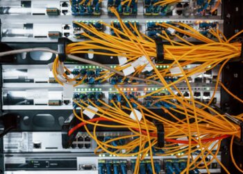 Close up view of internet equipment and cables in the server room