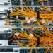 Close up view of internet equipment and cables in the server room